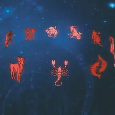 Znak zodiaku 15 czerwca to Bliźnięta. Widoczne są czerwone symbole zodiaku na tle nocnego nieba.