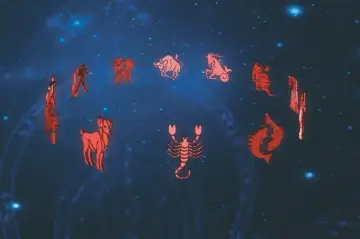 Znak zodiaku 15 czerwca to Bliźnięta. Widoczne są czerwone symbole zodiaku na tle nocnego nieba.